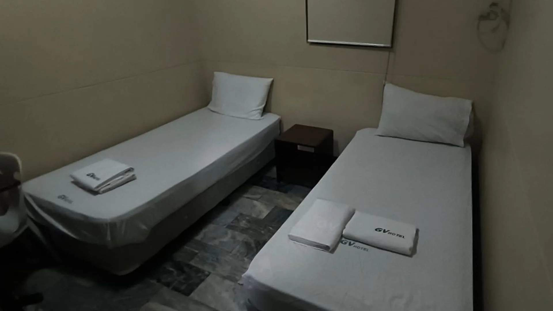 Inside bare hotel room used by alleged Bondi gunmen before terror attack
