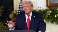 Trump announces 'warrior dividend' for troops as he defends economic record