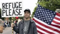 South Africa defiant after US threatens 'consequences' over refugee centre raid