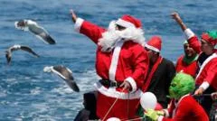 Waterskiing Santas and giant cuts of meat: Christmas around the world