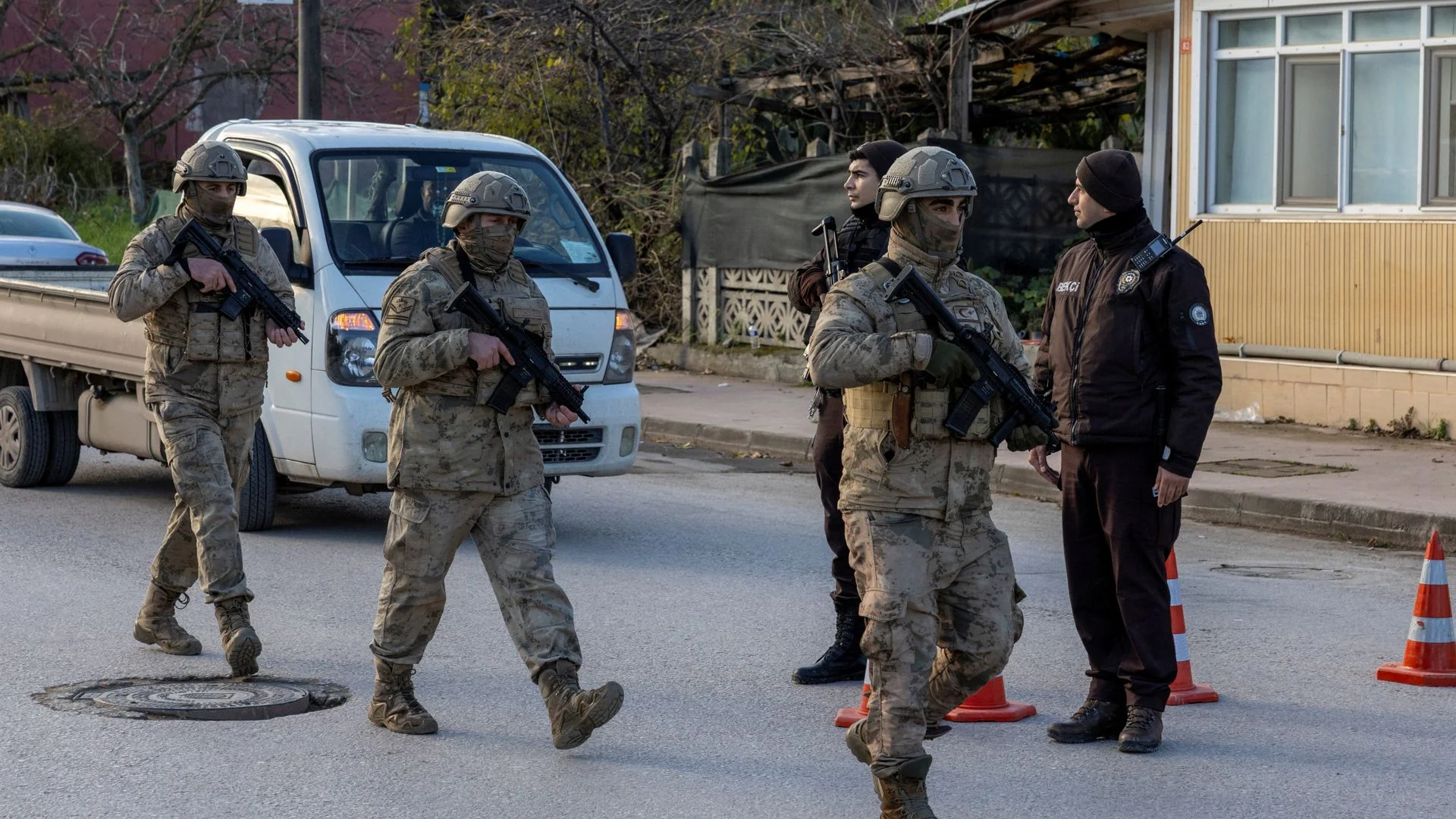 Three police officers and six militants killed in shooting in Turkey 