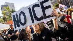 Thousands march and dozens arrested in Minneapolis protests against ICE 