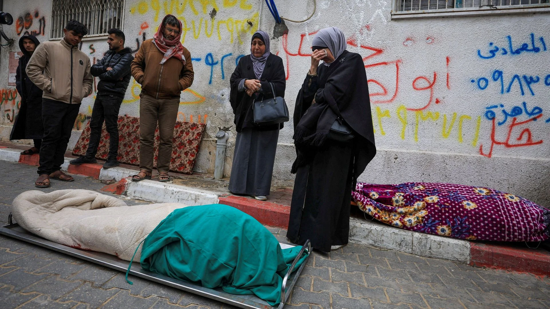 Four people killed in Gaza after walls collapse on tents during strong winds - health officials