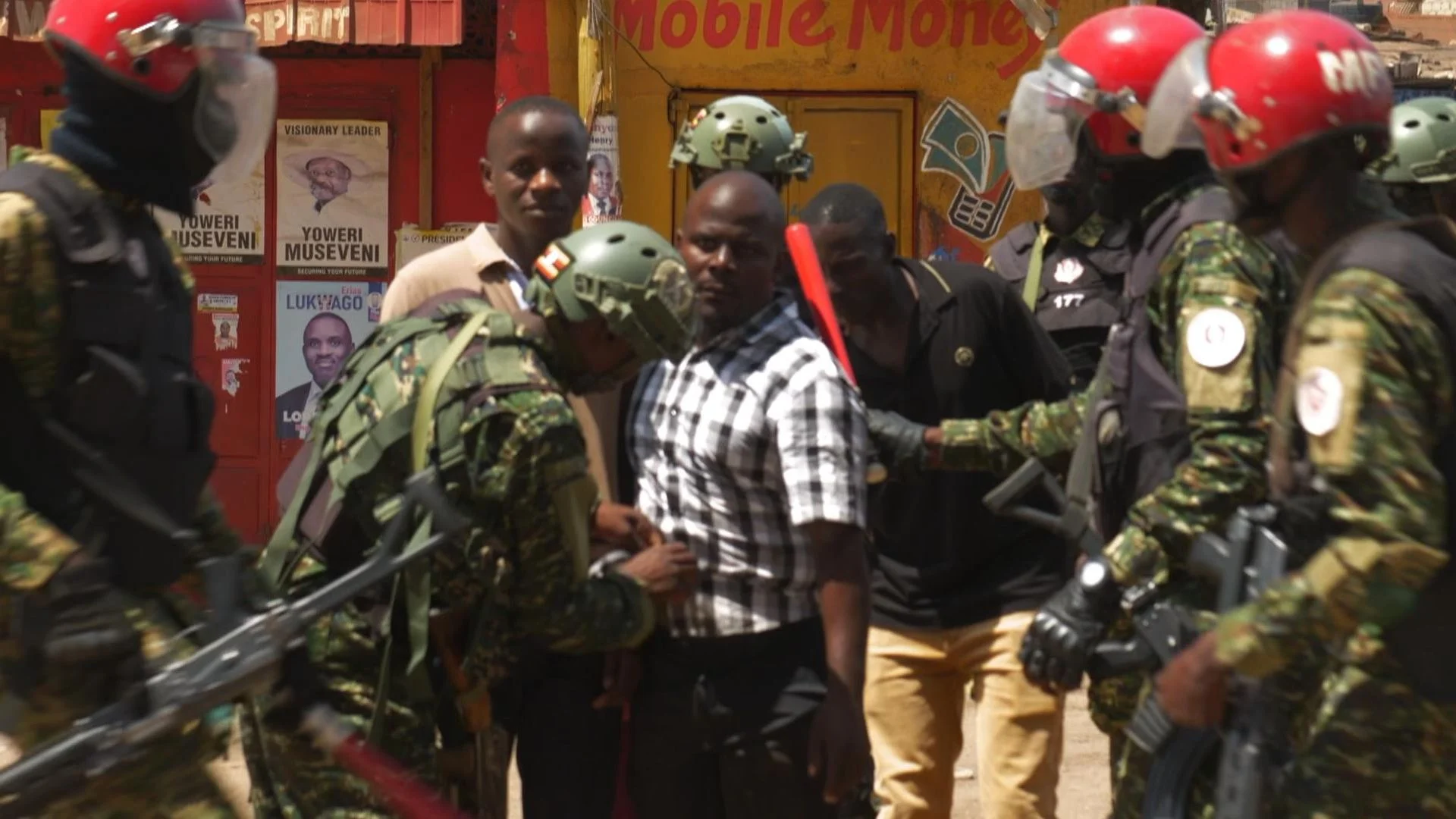 'People power' opposition supporters shout as voting count in Uganda election turns violent