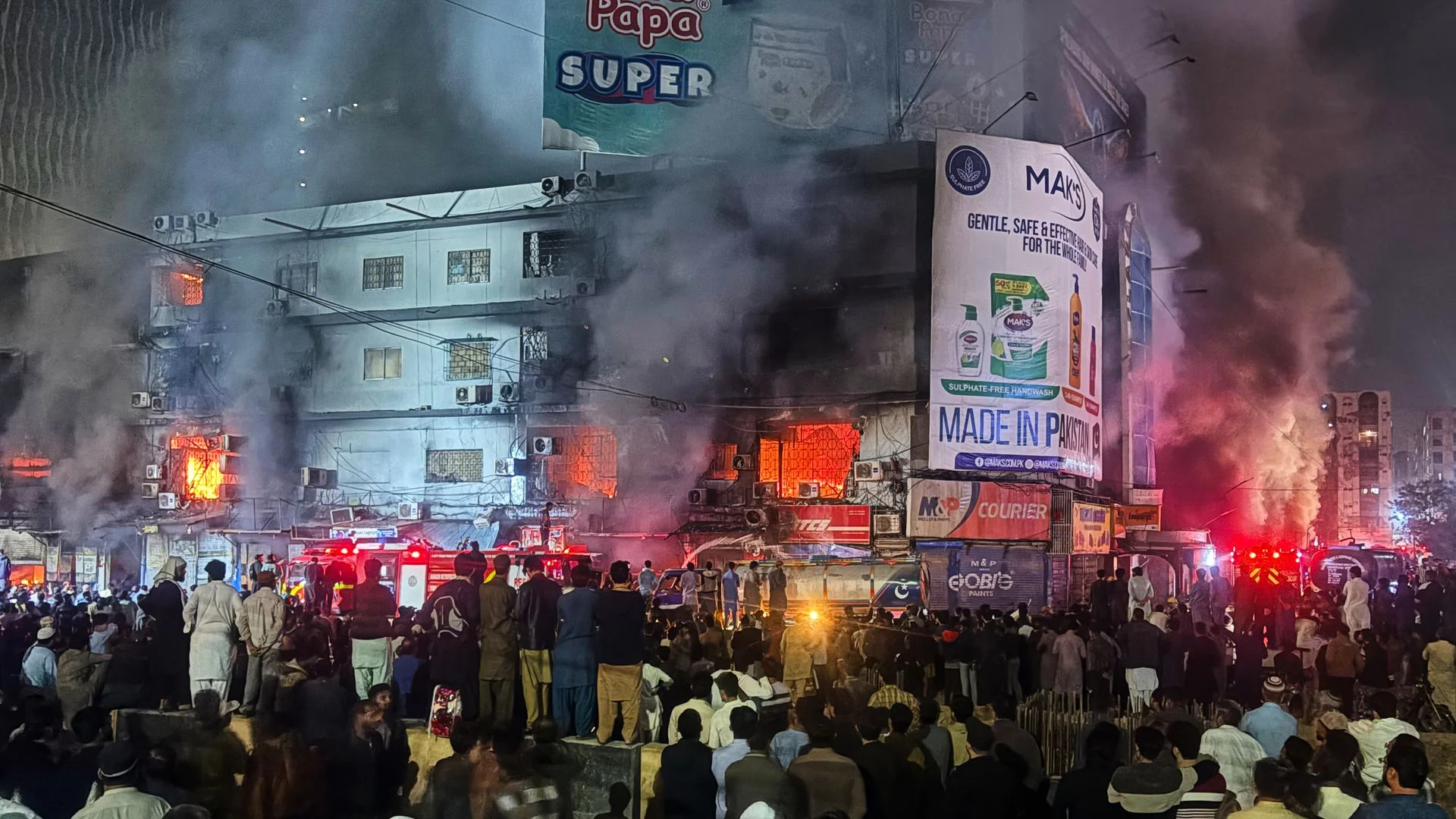 At least three people killed after huge shopping centre fire in Pakistan