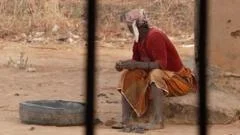 'Blood was all over' - victim of Nigeria church abduction describes escape