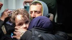Gazans returning through Rafah crossing describe checks by Palestinian militia