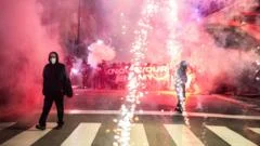 Italian police arrest protesters after clash in Olympic host city Milan