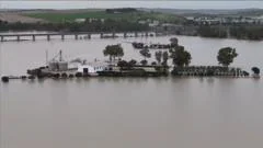 Aerial footage shows flooded cities as storms hit Spain