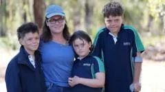 Emergency call released of boy who swam for hours to save family