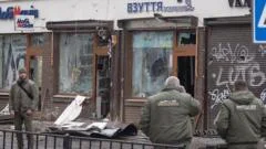 Explosions kill police officer and injure 25 in western Ukraine