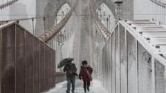 Powerful winter storm slams US north-east as NYC issues travel ban