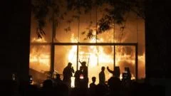'I can't breathe any more': Inside the night a mob burned a newspaper