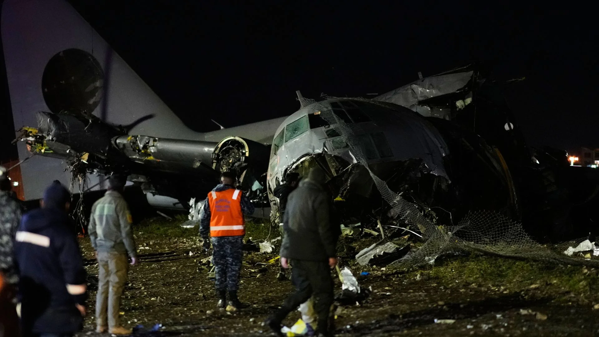 At least 15 killed after military plane crashes on to busy road in Bolivia