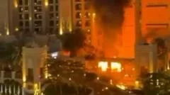 Luxury Dubai hotel hit as Iran launches retaliatory strikes across region