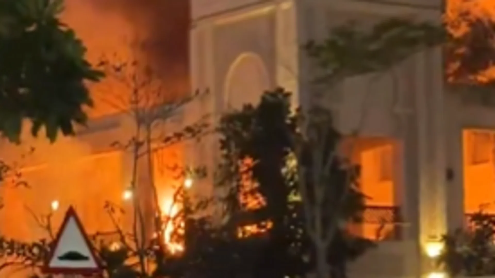 Dubai hotels hit during Iranian missile fire with people running for cover