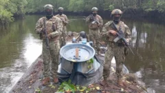 Ecuadorean troops find 35m-long 'narco-sub' hidden in nature reserve