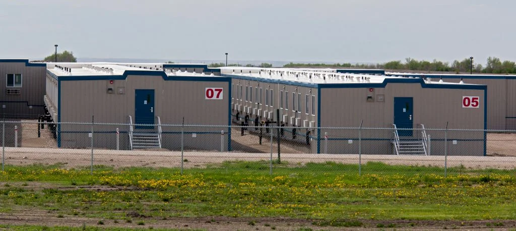 Owner of ICE detention facility sees big opportunity in AI man camps