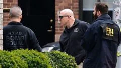 Two men charged with terror offences after homemade bomb thrown outside NYC mayor's home