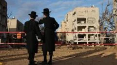 Iranian missiles injure 180 in towns near Israeli nuclear site
