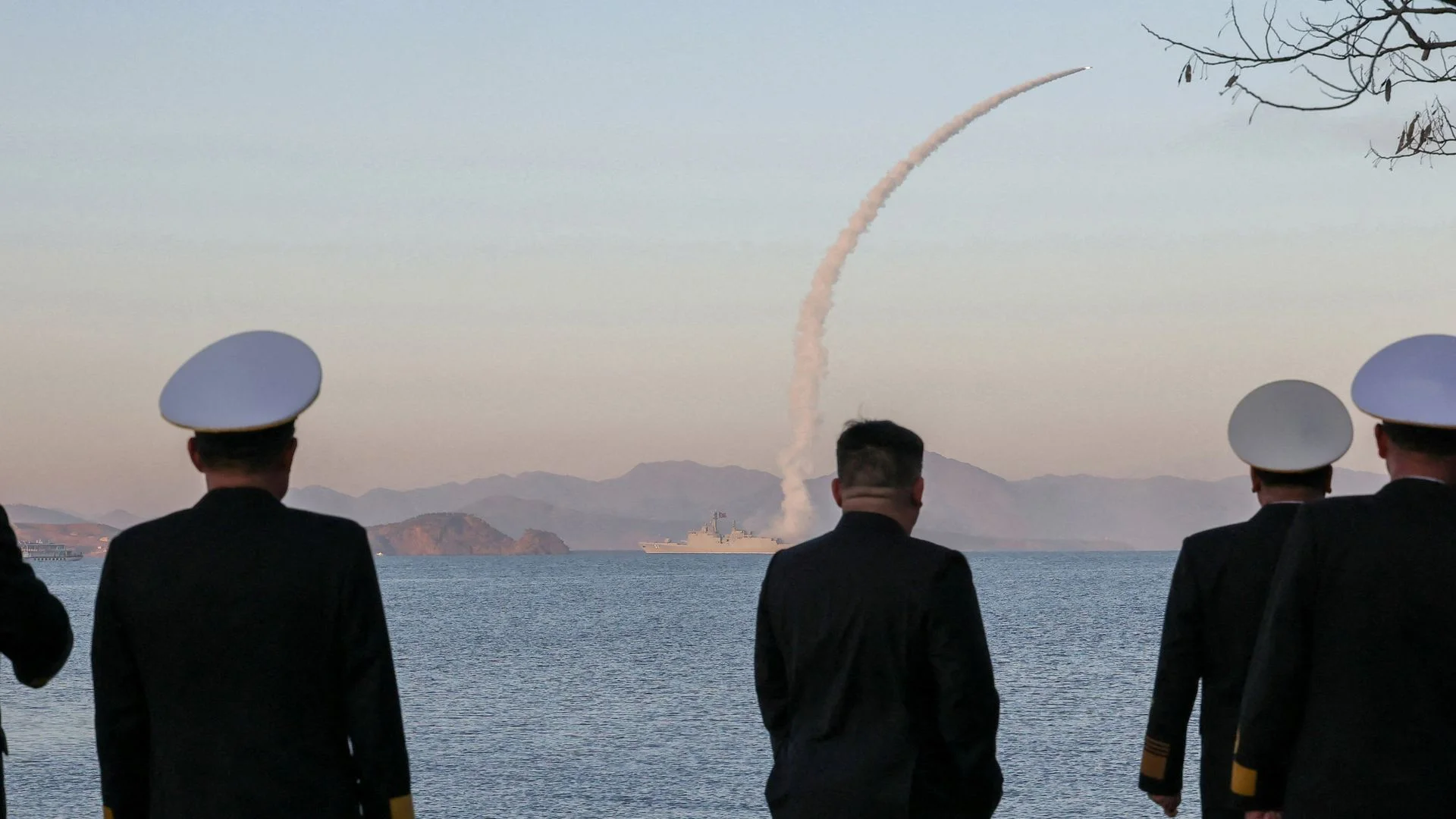 North Korea tests cruise missiles from new warship as Kim Jong Un watches 