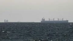 Strait of Hormuz closed again, Iran says, as ships attacked