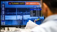 Japan on high alert for 'huge' second quake after lifting tsunami warning