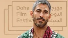 US-Kuwaiti journalist held in Kuwait over social media posts acquitted, lawyers say