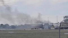 Two dead after small plane crashes into Australia airport hangar