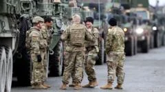 Trump says US studying troop cuts in Germany, as spat with Merz intensifies