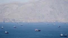 US threatens shipping firms with sanctions if they pay Iran tolls