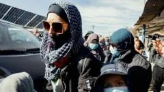 IS families in Syria have booked tickets home to Australia, minister says