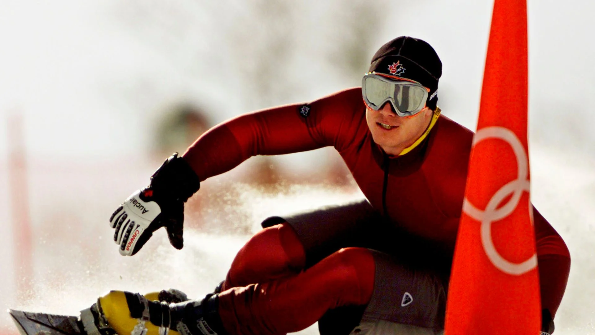 Former Olympic snowboarder wanted by US charged with masterminding murder of witness