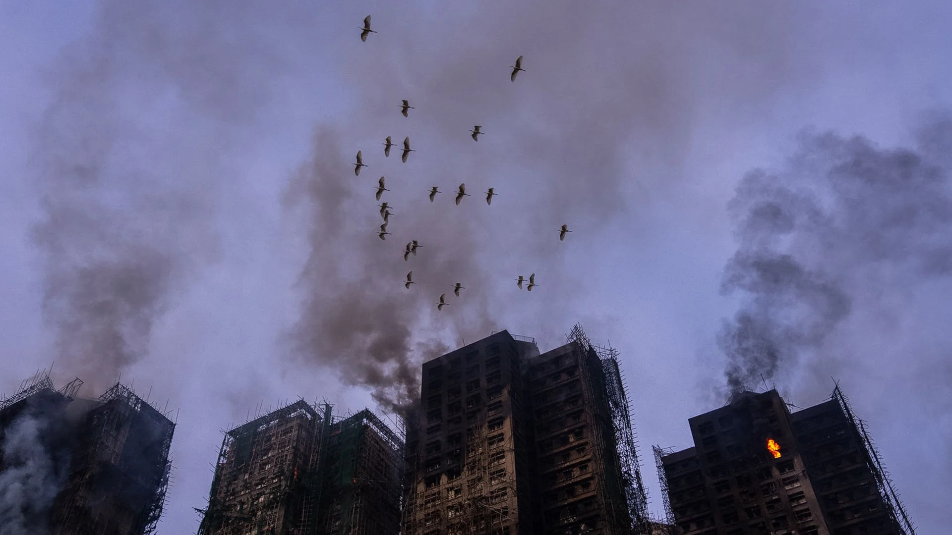 'Even if my parents are dead, I just want to know': Hong Kong residents stunned by tower tragedy