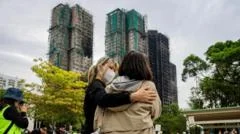 Hong Kong orders removal of scaffolding mesh after deadly blaze