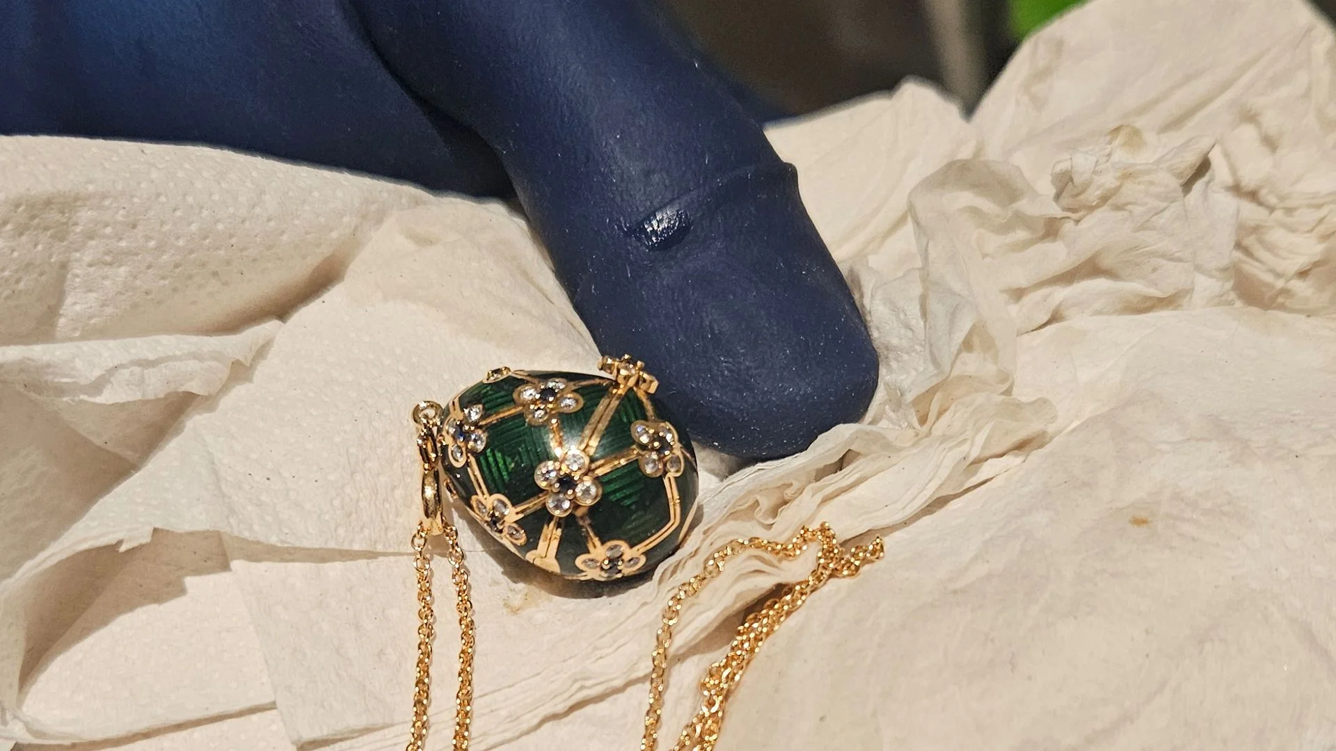 Stolen Fabergé pendant passed to police - quite literally
