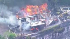 'We've lost everything': Australia wildfire rips through homes