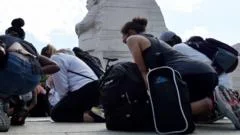 Sacked agents sue FBI, saying they were punished for taking the knee