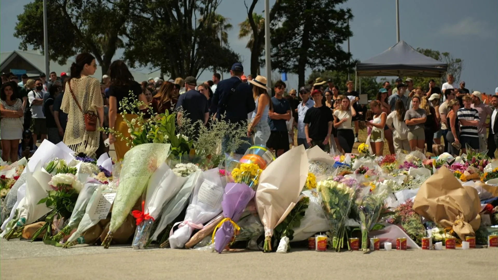 'Utter panic and chaos': Site of celebration at Bondi now a memorial to mass shooting