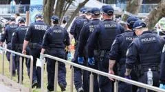 Police 'shot in the front': NSW premier rejects criticism of Bondi response